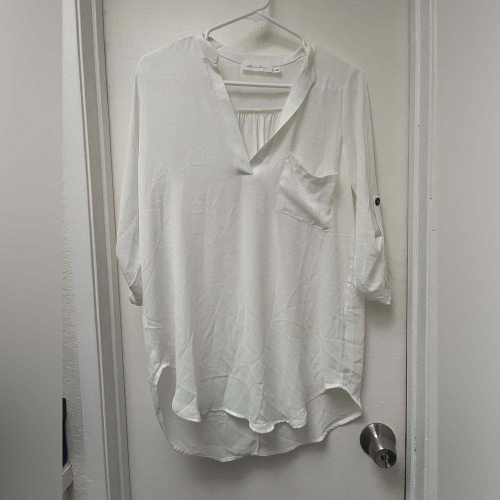 Women’s white tunic blouse never worn